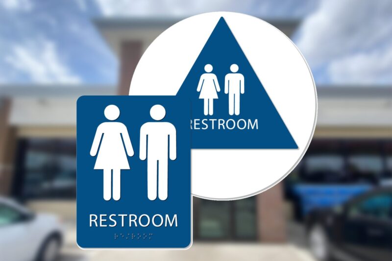 Restroom sign with male and female symbols.