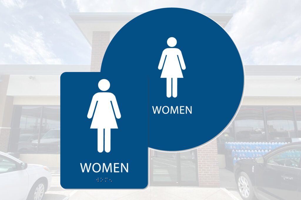 Women's restroom sign with braille.