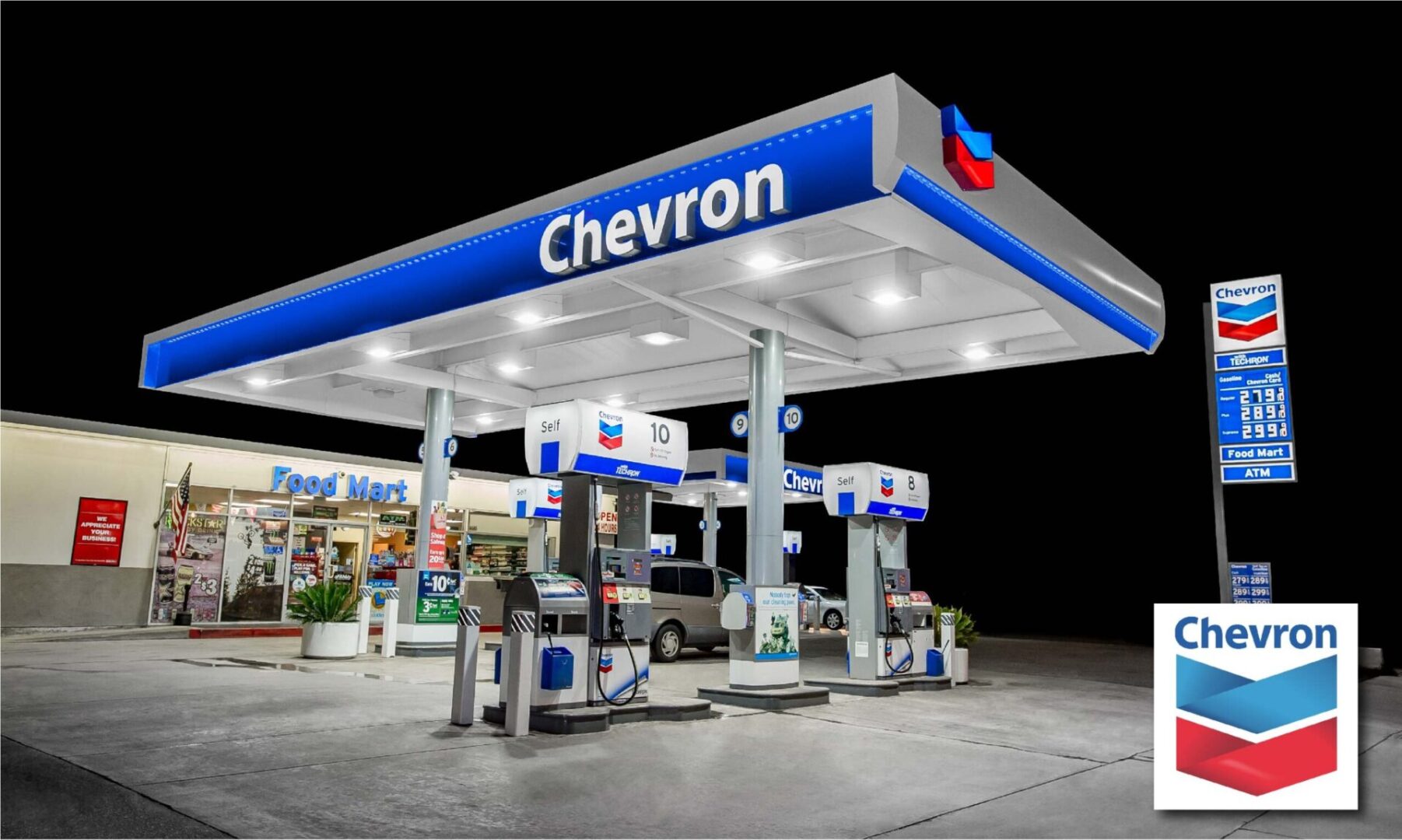 Chevron gas station at night with store.