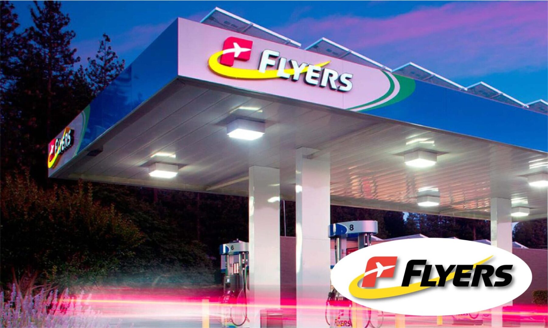 Flyers gas station at night.