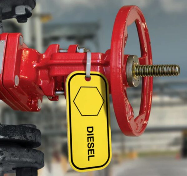 Red valve with a yellow diesel tag.