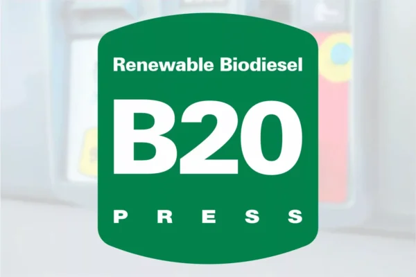 Green sign with white text: B20 Press. Renewable biodiesel.