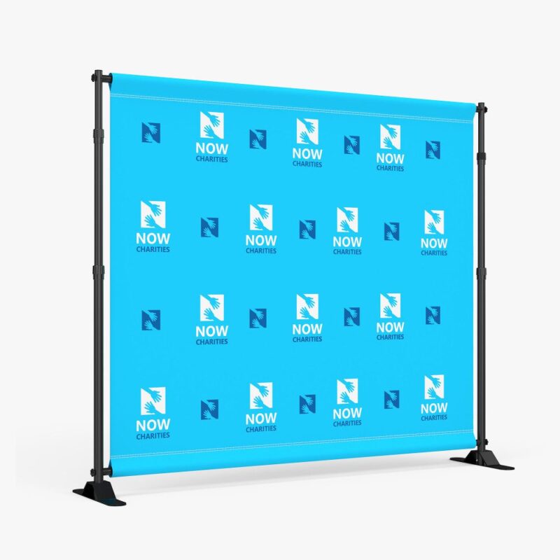 Blue backdrop with NOW Charities logo.