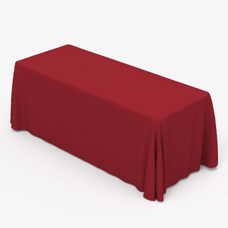 Red rectangular tablecloth on table.