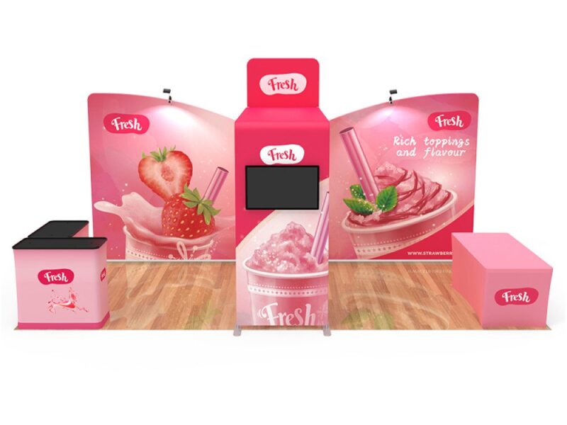 Pink strawberry smoothie trade show booth.